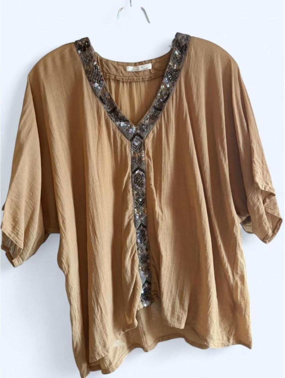 Orange sequin and beaded blouse with a boho vibe